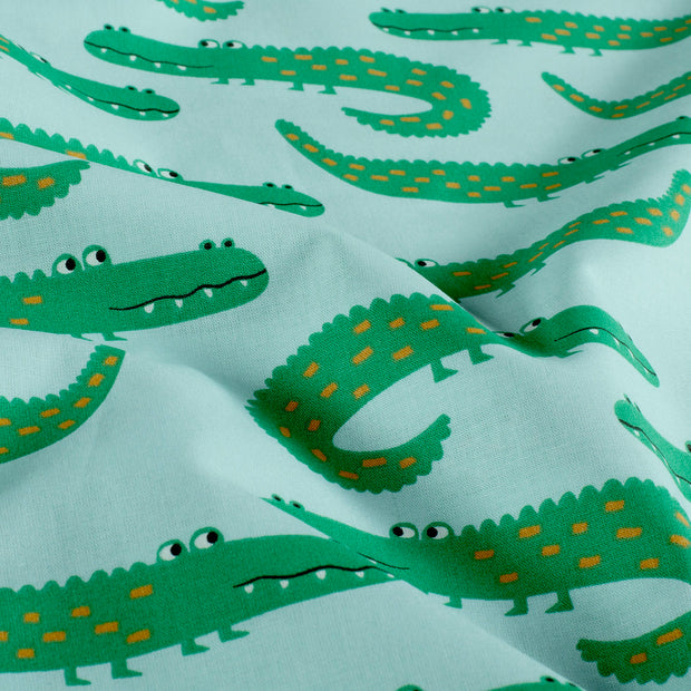 Popeline de Coton tissu crocodiles Bleu bébé