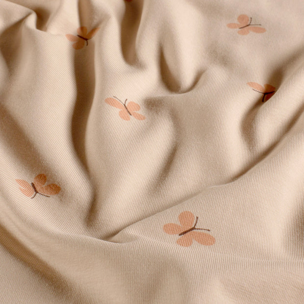 Jersey tissu papillons Nude