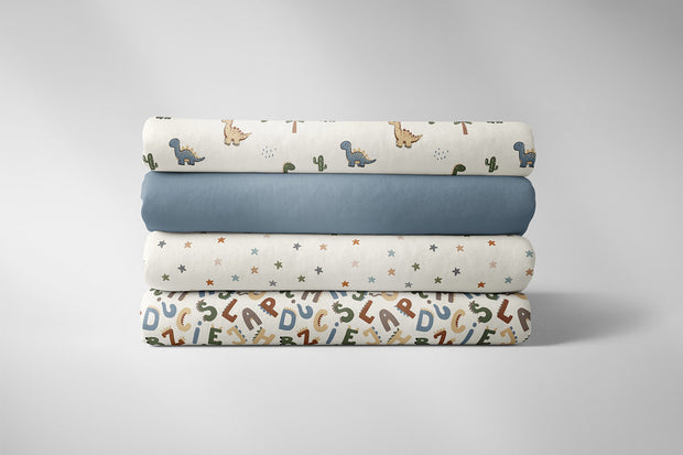 Cotton Poplin fabric Dinosaurs Off White