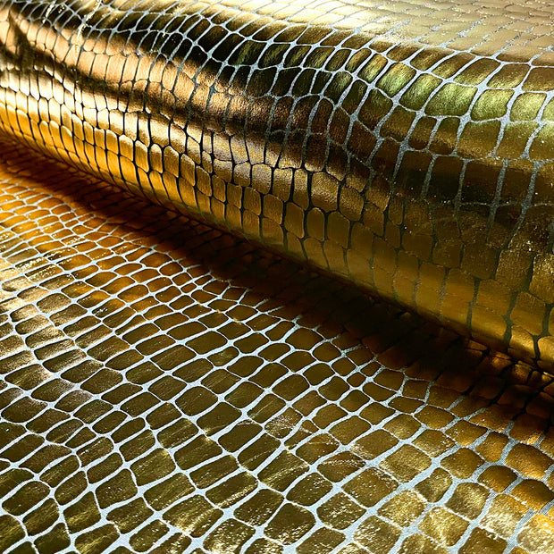 Lamé tela Cocodrilos Oro
